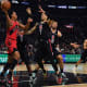 Toronto Raptors forward Scottie Barnes (4) controls the ball against Los Angeles Clippers guard Amir Coffey (7) during the second half at Crypto.com Arena